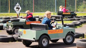 Mini Landrovers ride at Diggerland UK Theme Park.